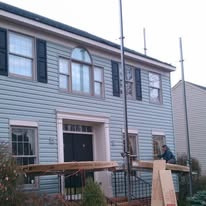 Complete siding replacement featuring premium insulated vinyl by The Contractor INC